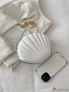 BirdinBag - Compact Dome Bag with Stylish Shell Design White Crossbody Evening Bag For Mobile Phone, White Crossbody Evening Bag With Phone Holder, White Crossbody Clutch For Mobile Phones, White Crossbody Clutch With Phone Pocket, White Crossbody Mobile Phone Clutch, White Portable Pouch Bag, Portable White Pouch Bag, White Bags With Removable Pouch As Fashion Accessory, Trendy White Pouch Evening Bag