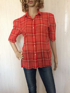 Vintage Blouse Woman Summer Blouse Red Checkered Blouse Blouse Size 42 Short Sleeves Brand: Jones New York Registered size: 12 = 42 Fr era: 80s Material: 70% cotton, 30% polyester, fine fabric Color: red, white, blue Pattern: tiles Sleeves: short, puffy start Cut: Adjusted Season: summer- half season Closing: front buttons Corresponds to a 42 (3) (L) (UK.14 (USA.12) (Italy.46) (Germany.40) (Japan.11) May be suitable for a smaller size depending on how one likes to wear it Please check your measu Red Short Sleeve Cotton Blouse, Plaid Short Sleeve Blouse For Work, Collared Plaid Tops For Daywear, Plaid Collared Top For Daywear, Vintage Red Cotton Blouse, Classic Red Cotton Blouse, Plaid Short Sleeve Tops For Daywear, Red Cotton Tops For Work, Red Cotton Workwear Tops