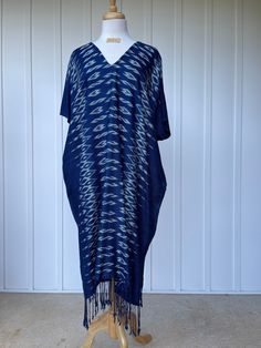 You will look fabulous in this truly unique hand made kaftan from hand woven (with hand woven pattern!) and hand dyed thread. The kaftan feels as good as it looks with soft and graceful drape. Pefect for evening wear, events and out and about it is made with care and long lasting quality. Traditional V-neck Kaftan With Tassels, Oversized Blue Bohemian Tunic, Blue Ikat Print Kaftan For Summer, Summer Blue Ikat Print Kaftan, Bohemian Blue Kimono With Natural Dye, Blue Bohemian Kimono With Natural Dye, Indigo Tunic Kaftan, Blue Bohemian One Size Kaftan, Bohemian Handloom Tunic Kurta