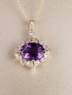 "Amethyst and Diamond Halo Pendant. This vintage look pendant showcases a vivid, deep purple, Oval cut Genuine Amethyst gemstone, suspended in place by (4) substantial gold prongs and surrounded in a halo of genuine bright white Diamonds. All 14k Yellow Gold. **Amethyst is a February Birthstone, and the Pantone color of the year for 2018. **This listing is for the pendant only. Chain not included, for display purposes only. 14kt Yellow Gold chains available for purchase upon request. **Please fe Elegant Marquise Amethyst Jewelry, Exquisite Purple Jewelry With Center Stone, Gold Amethyst Jewelry With Halo Setting, Classic Amethyst Necklaces For Wedding, Elegant Purple Marquise Jewelry, Purple Amethyst Necklace With Prong Setting, 14k Gold Jewelry With Purple Accent Stones, Purple 14k Gold Jewelry With Accent Stones, Yellow Gold Amethyst Jewelry With Halo Setting