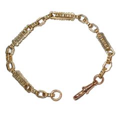 9ct Yellow gold fancy link 'watch chain' bracelet. This chain was part of an antique watch chain, circa 1900. Clasp added in recent years.  Weight   13.5 grams Length of chain 21.5 cm Each and every piece listed by Vintage Fine Jewellery has been restored by hand in our London workshop by highly skilled jewellers. Our jewellers use the same expertise to restore a piece of jewellery, as used in their creation many years ago. If you would like to see more of the Vintage Fine Jewellery Collection, Antique Hallmarked Chain Bracelet For Formal Occasions, Antique Gold Bracelet With Lobster Clasp, Antique Yellow Gold Link Bracelet, Vintage Yellow Gold Bracelet With Rectangular Links, Vintage Yellow Gold Link Bracelets, Vintage Yellow Gold Link Bracelet, Vintage Yellow Gold Oval Link Bracelet, Antique Oval Link Bracelet For Formal Occasions, Vintage Gold Curb Chain Bracelet