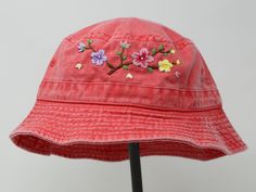 Item: flower embroidered bucket hat Material: 100% cotton Size: one size fits most Embroidery: hand made with acrylic thread Free first class shipping, upgradable priority mail service. 30 days return policy, feel confident at your purchase! Adjustable Cotton Hats For Spring, Casual Spring Sun Hat With Flower Shape, Adjustable Cotton Spring Hats, Casual Flower Shaped Sun Hat For Spring, Casual Flower-shaped Sun Hat For Spring, Spring Cotton Cap, Cotton Sun Hat With Short Brim For Spring, Spring Cotton Bucket Hat With Curved Brim, Casual Embroidered Sun Hat With Curved Brim