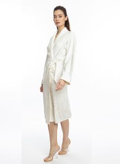 Wrap yourself in pure Bliss with our Angel White Long Robe. This luxurious robe is adorned with soft, angelic flower swirls and made of absorbent microfiber, making you feel like a true angel. Experience the ultimate comfort and indulgence with our Bliss robe. One size Long bath/lounge Robe Shawl collar 2 bottom side pockets Belt loops/removable waist tie closure Made of soft and absorbent microfiber Machine wash cool Tumble-dry low Elegant Silk Sleepwear For Relaxation, Elegant Cream Sleepwear For Loungewear, Elegant Cream Robe For Daywear, Elegant White Sleepwear For Relaxation, Elegant Cream Sleepwear, Elegant White Robe For Relaxation, Feminine Cream Robe For Loungewear, Long Bath, Lounge Robes