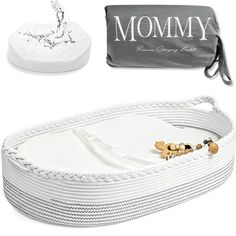 a white tray with some items on it and a bag next to it that says mommy