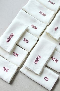 many white napkins with red words on them