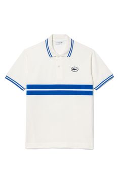 Sporty and French-inspired, this classic-fit polo features placed stripes, tipped edges and a silicone logo at the chest for iconic Lacoste style. 28" length Button half placket Spread collar Short sleeves 100% cotton Hand wash, line dry Imported Cheap Casual Polo Collar T-shirt, Lacoste Sportswear, Polo Tshirts, Grafic Tees, Polo Tee Shirts, Polo Lacoste, Lacoste Shirt, Creative T Shirt Design, Polo Shirt Design