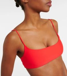 Material: 78% nylon, 22% elastane.Care instructions: hand wash.Made in the USA.Designer color name: Coral.True to size.Cup size: A/B.Minimal coverage.If you wear a C cup or bigger, we recommend trying one size larger.The model seen in the picture is 178cm-5'10', cup size B, and wearing a size XS Padded Fitted Swimwear For Workout, Seamless Elastane Swimwear For Workout, Padded Swimwear For Workout, Sporty Padded Swimwear For Workout, Seamless Swimwear For Beach Workout, Trendy High Stretch Seamless Swimwear, Trendy Seamless High Stretch Swimwear, Trendy High-stretch Seamless Swimwear, Stretch Cropped Swimwear For Swimming