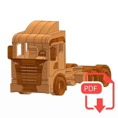 a wooden model of a truck with an arrow pointing to the side