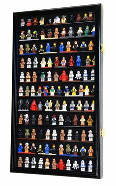 a large display case filled with star wars figurines and lego minifigurs