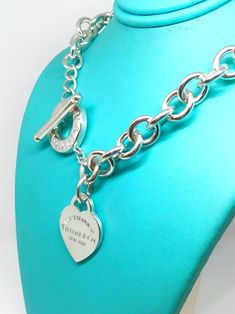 Beautiful! Authentic Tiffany & Company "Return to Tiffany" Heart Tag Toggle Necklace Like New Condition Sterling Silver 73.5 grams 15.5" Long Heart Measures 3/4"x1" Comes with a Gift Box!!! 100% Authentic Guaranteed! Return To Tiffany Necklace Outfit, Tiffany And Co Necklace Aesthetic, Tiffany Jewelry Aesthetic, Tiffany Hardwear Necklace, Tiffany Toggle Necklace, 2000s Necklace, Heart Tag Toggle Necklace, Tiffany Heart Necklace, Return To Tiffany Necklace