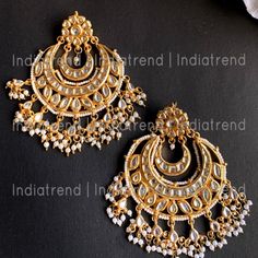 These Are A Pair Of Magnificent Earrings I Bought To Go With My Wellgroomed Anarkali Gown (Please See My Other Listing) For A Wedding That Was Canceled Indefinitely Due To The Pandemic. It Is A Gold Plated Earrings Studded With Simulated Kundan And Faux Pearl. Measures Approx: 110 X 65mm Or 4 1/2 " X 2 1/2" With Post Back Findings For Pierced Ears. Base: High-Grade Alloy Metal Never Been Worn, Brand New! I Also Offer Free Shipping If You Buy Both The Gown And The Earrings :) White Danglers With Intricate Design For Reception, White Jhumkas For Reception And Festivals, White Jhumkas For Diwali Reception, Bollywood Style White Bridal Earrings For Reception, Festive White Bridal Earrings With Intricate Design, White Jhumkas With Intricate Design For Reception, White Temple Jewelry Jhumkas For Reception, Fusion Style White Bridal Earrings With Latkans, White Jhumkas With Latkans For Reception