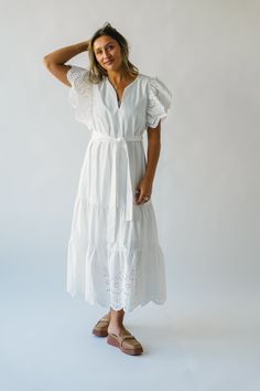 Get ready to turn heads in the Cresswell Eyelet Detail Dress! This stunning off-white dress features eyelet detailing and a figure-flattering silhouette, perfect for any occasion. With its playful design and unique features, this dress is sure to make a statement wherever you go. Be the talk of the town in the Cresswell Eyelet Detail Dress! Details self: 100% cotton lining: 100% rayon Fabric Care Guide Here Sizing & Fit Measurements are approximate and taken while laying flat across the front. N Drop Shoulder Cardigan, Off White Dresses, Talk Of The Town, The Talk, Unique Features, Rayon Fabric, Cardigan Jacket, Playful Design, Dress Details