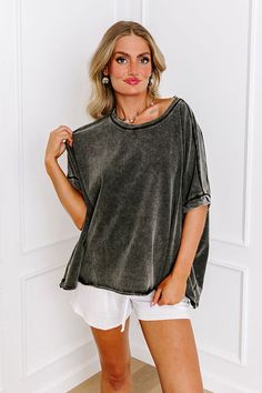 - Cool laid-back style steals the show with this effortlessly trendy top! Embrace the easy-breezy feel while making a statement with its unique mineral wash. This must-have piece is the wardrobe update you need for everyday casual style. - Unlined mineral washed material - A crew cut neckline - Short drop sleeves - An oversized silhouette that ends in a rolled high-low hemline Oversized Stonewashed Cotton Tops, Oversized Washed Black Top, Acid Wash Soft-washed Tops For Loungewear, Fall Stonewashed Black Top, Oversized Acid Wash Summer Top, Oversized Acid Wash Tops For Summer, Oversized Washed Black Casual Top, Acid Wash Distressed Tops For Loungewear, Acid Wash Distressed Top For Loungewear