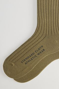 Simple knit trouser socks by Standard Cloth with a ribbed ankle cuff. Urban Outfitters exclusive. Features Standard Cloth trouser crew sock Ribbed knit socks Crew length UO exclusive Content + Care Includes 1 pair 85% Cotton, 13% polyester, 2% spandex Machine wash Imported Size Fits Men's shoe size 7-12 | Standard Cloth Trouser Crew Sock in Olive, Men's at Urban Outfitters Classic Comfortable Solid Color Socks, Comfortable Classic Solid Color Socks, Comfortable Classic Socks, Casual Solid Color Knee-high Socks, Classic Fitted Ribbed Socks, Classic Ribbed Fitted Socks, Classic Ribbed Socks, Classic Stretch Knee-high Socks, Classic Cotton Socks For Winter