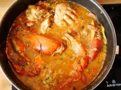 lobster stew in a pan on the stove