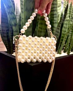 There is only 1 available at a discounted price.  Includes short pearl handle and long gold chain.  Size: Width:19-20 Height:13-14cm Depth:3-4cm Shipping & Delivery: Express Fast Shipping (DHL, FEDEX, TNT, UPS) Important Notes; ⚠️We are not responsible for any customs duties, taxes and clearance fees that may occur. Buyers are responsible for all the fees that may occur during shipment. We have no control over these charges and cannot predict what they may be. ⚠️Please note that the colors may a Chic Pearl Evening Bag For Gift, Chic Pearl Evening Bag As Gift, Gold Pearl Evening Bag For Events, Gold Pearl Clutch For Parties, Gold Pearl Bags For Formal Occasions, Party Gold Pearl Clutch, Gold Pearl Party Clutch, Formal Gold Pearl Bags, Pearl White Evening Bag With Pearl Handle