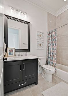 a bathroom with a sink, toilet and bathtub