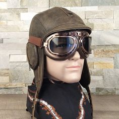 "Aviator pilot helmet, WW2 military style steampunk hat, in real leather, old brown color, with or without aviation goggles, for Men and Women, William model. - Handmade hat with QUALITY MATERIALS. It's MADE TO LAST MANY YEARS. - Model timeless vintage style with round and zipper on the side that reminds the helmets of the first aviators. THERE IS NO HOLE THAT GOES INSIDE THE LINING, zippers are decorative. Nylon lining, which is comfortable for spring, summer, and fall. - A buckle at the back o Adjustable Windproof Aviator Hat, Leather Windproof Hats For Outdoor Use, Vintage Brown Travel Hat, Leather Hat With Ear Flaps For Outdoor, Brown Hats With Ear Flaps For Outdoor Activities, Brown Retro Hat For Outdoor, Brown Aviator Winter Hats, Brown Hats With Ear Flaps For Outdoors, Winter Brown Aviator Hats