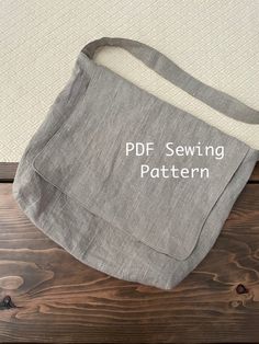 "This is a PDF pattern only, not a finished product.  Your PDF File will be ready for instant download once your payment is processed. Crossbody Messenger Bag with slip pocket using fabric of your choice.  A heavier weight fabric is recommended (linen or canvas) though any cotton fabric will do.  Perfect for school or work. Finished Dimensions 15\" W x 11 1/2\" H x 4\" D.   Pocket 6\" W x 6 1/4\" H. Strap:  43\" Long PDF File Includes pattern, materials needed, and easy to follow step by step in Messenger Bag Patterns Sewing, Sewing Messenger Bag, Messenger Bag Pattern Free, Diy Messenger Bag Pattern, Messenger Bag Sewing Pattern, Crossbody Bag Sewing Pattern, Messenger Bag Pattern, Messenger Bag Patterns, Diy Messenger Bag