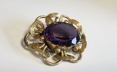 "RARE Beautiful Antique Victorian Faceted Brooch from the 1800s in an very good, vintage condition.               Brooch clasp opens & closes after pulling it from the latch ring & holds pin in place. Brooch width 6cm, Brooch height 4.5cm. The brooch has some weight to it. There is some scratches to the top of the facet but due to its age and size this is expected. There is a beautiful filigree design on the leaves. I have not tested for precious metals or gemstones so I cannot declare this. Ear Vintage Ceremonial Jewelry With Screw Back, Victorian Hallmarked Brooches For Ceremonial Use, Victorian Antique Gold Brooch For Formal Occasions, Antique Gold Victorian Brooch For Formal Occasions, Antique Wedding Brooches, Victorian Style Collectible Screw Back Brooches, Victorian Brooches For Vintage Events, Antique Hallmarked Brooches For Ceremonial Occasions, Antique Bronze Brooches For Collectors