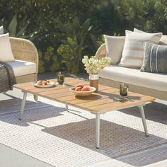 a coffee table sitting on top of a patio