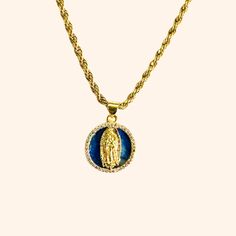 Our Blue Virgin Mary Necklace sits on an elegant rope chain that's waterproof for your lifestyle. Its dark blue pendant give it that flare it needs. The Virgin Mary symbol is commonly worn for protection. ✔Hypoallergenic ✔Quality Guaranteed ✔Waterproof ✔Handmade MATERIAL: Stainless steel dipped in real 18k gold, cubic zirconia COLOR: gold, dark blue SIZE: 18 inches unless otherwise requested Mary Symbol, Blue Virgin Mary, Mary Necklace, Virgin Mary Necklace, The Virgin Mary, Blue Pendant, Blue Evil Eye, Evil Eye Necklace, Eye Necklace