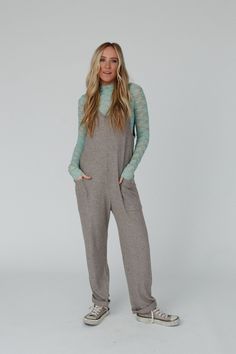 Calling all of our wild things, we have the jumpsuit for you; the Running Wild Relaxed Pocketed Jumpsuit! So, so cozy with a fun design, you're going to love this sweater because it features: Comfortable, stretch, waffle knit fabric Relaxed and loose jumpsuit silhouette Flattering scoop neck and backline with thick tank top straps and dropped armholes Convenient oversized patched pockets Classic, loose, straight pant legs (Consider rolling the ankle for a cute detail!) Wear it alone or layered o Relaxed Fit Jumpsuits And Rompers For Loungewear, Relaxed Fit Overalls Jumpsuit For Loungewear, Relaxed Fit Bodysuit For Spring Loungewear, Relaxed Fit Overalls For Loungewear, Cozy Winter Loungewear Jumpsuits And Rompers, Relaxed Fit Long Sleeve Jumpsuits And Rompers For Lounging, Relaxed Fit Long Sleeve Jumpsuit For Lounging, Casual Fall Jumpsuits And Rompers For Loungewear, Casual Fall Loungewear Jumpsuits And Rompers