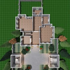 an overhead view of a floor plan for a house in the middle of a green area