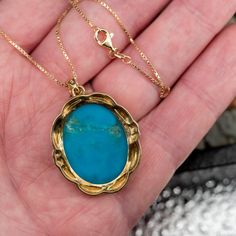 This stunning turquoise pendant is crafted of 18k yellow gold and hangs from a 17 inch long 14k yellow gold box chain. Large Pendant Necklace, Turquoise Pendant Necklace, Gold Box, Turquoise Pendant, Box Chain, Yellow Gold, Turquoise, Pendant Necklace, Chain