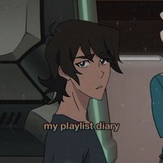 two people standing next to each other in front of a tv screen with the words my playlist diary written on it