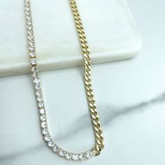 14k Gold Filled Necklace with Half Side Clear Tennis Zirconia & Half Side Curb Link Chain, 17.5 Inches and Extender, Wholesale Price Jewelry. Necklaces Size: - Length:  17.5 Inches with 2 Inches of extender - Thickness: 3mm 💎 With new products daily, quality and competitive prices, in DiJu Jewelry you find the most unique styles of modern designs, always looking for elegance and market trends.  *Helping your Jewelry Businesses Grow *Starting your Own Business *Making your Own Collection: DiJu Jewelry ever brings Better Moments for your Life.  📲 Find many more styles in our DiJu Jewelry Etsy Store:https://www.etsy.com/shop/DJDiJuJewelry  💎 You can choose from unique styles of earrings, necklaces, pendants and charms, bracelets, anklets, rings, chokers, and many others. On the off chance Cubic Zirconia Gold Chain Necklaces, Round Cubic Zirconia Necklace With Gold Chain, Cubic Zirconia Diamond Necklace With Curb Chain For Gifting, Cubic Zirconia Curb Chain Necklace, Gold Cubic Zirconia Diamond Necklace With Curb Chain, Gold Cuban Link Tennis Necklace For Gift, Gold Tennis Necklace With Adjustable Chain And Cubic Zirconia, Gold Tennis Necklace With Diamond Accents As A Gift, Gold Cubic Zirconia Tennis Necklace Gift