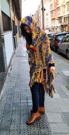 "Welcome! This beautiful sweater poncho is made of high quality blend wool fabric It's soft, lightweight warm and cozy with cool design! Its really amazing and is in very good condition! The measurements ( approximately ): width: 33.07\"= 84 cm Height : 44.48\"= 113 cm Thanks for stopping by!!IMPORTANT: Due to the delicate situation We're all going through, and in order to keep the safety of courier workers too, all orders will be dispatched when alert sanitary finished. You can purchased or res Casual Winter Poncho With Tassels, Long Sleeve Poncho For Winter Festivals, Cozy Knit Shawl For Winter, Handmade Cozy Shawl For Winter, Handmade Cozy Winter Shawl, Handmade Shawl Cape For Winter, Cozy Handmade Winter Shawl, Bohemian Poncho With Scarf For Winter, Knitted One-size Shawl For Winter