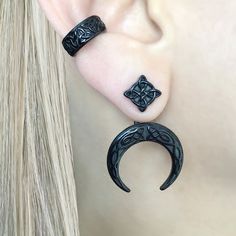 These Celtic Moon ear jacket earrings are made from stainless steel and feature intricate Celtic moon and knot design. The earrings are perfect for completing your look with a unique and timeless touch. Sold as pair Material : 316 Stainless steel Gauge: 0.7mm/23G regular piercing Size: 35mm long(edge to edge) Stud:11mm long Closure: Push pack Ships in a gift box Listing for earrings only, cuff is not included Cheap Black Witchy Jewelry, Wiccan Jewelry Goth, Affordable Black Witchy Jewelry, Cheap Whimsical Black Jewelry, Witchy Jewelry Nightrider Jewelry, Witch Accessories Modern, Viking Earrings, Earrings Celtic, Celtic Moon