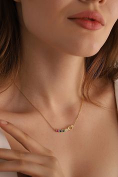 We creating this handmade birthstone necklace you see using 925 sterling silver and 14k gold. It is the perfect accessory that will suit your shine or make it feel special. It will be a unique gift that will add meaning to your precious days such as graduations, birthdays, mother's days, wedding events. Just click this link for the bracelet of the same product :) https://www.etsy.com/listing/989229726/birthstone-bracelet-for-mom-custom If you like the personalized jewelry we have created for you Luxury Birthstone Jewelry For Proposal, Gold Sterling Silver Birthstone Necklace Gift For Her, Gold Sterling Silver Birthstone Necklace For Her, Heart Pendant Birthstone Necklace For May, Gold Sterling Silver Heart Pendant Birthstone Necklace, Pendant Charm Necklaces With Birthstone In Cubic Zirconia, Gold Heart Pendant Birthstone Necklace In Sterling Silver, Heart-shaped Gemstone Necklace For Birthday Gift, Sterling Silver Birthstone Necklace With Clavicle Chain For Anniversary