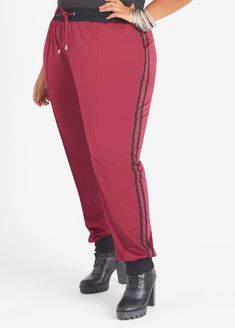 Reminiscent of our favorite retro style, these track pants are given a modern-day upgrade cut into tapered joggers that are fresh and new! Piped trims and side stripes add nostalgia to these stretch-knit pants that pair perfectly with the matching track jacket for a no-fuss, ultra fly outfit. Streetwear Cute, Knit Joggers, Plus Size Trendy, Tapered Joggers, Fly Outfit, 2000 Fashion, Joggers Set, Fashion Y2k, Ashley Stewart