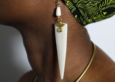 Elegant Handmade Bone-colored Jewelry, Traditional Bone-colored Jewelry As A Gift, Traditional Bone-colored Jewelry Gift, Unique Bone-colored Brass Jewelry, Unique Brass Jewelry In Bone Color, White Brass Dangle Jewelry, Handmade Metal Jewelry In Bone Color, Handmade Artisan Bone-colored Jewelry, Nickel-free White Brass Jewelry