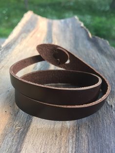 Brown Leather Bracelet, Men Women Gift present, Handmade leather Bracelet, Large wrist Bracelet. O4M-B28 Sign-up now for our Newsletter and receive a 10% Discount on your first order! https://mailchi.mp/7f649f87eb6c/only4men-newsletter This is a beautiful piece of jewelry, a unique and original Gift for Him! The Large Brown Bracelet length is about 8 inches. This will fit most wrist sizes, but please make sure before you order this will fit your wrist size. The closure system works like an ancho Brown Leather Wrap Bracelet For Gift, Brown Leather Wrap Bracelet As Gift, Adjustable Leather Wristband For Everyday, Brown Leather Wrap Bracelet Gift, Brown Leather Strap Wrap Bracelet Gift, Everyday Brown Bracelet, Adjustable Leather Strap Bracelets For Everyday, Adjustable Waxed Finish Bracelets For Everyday, Adjustable Leather Strap Wrap Bracelet For Everyday