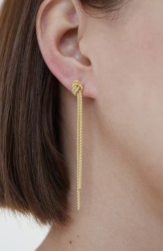 Beaded strands of sterling silver are plated in 18-karat gold and tied into knots to anchor these linear drop earrings. 2 1/2" drop; 3/8" width Post back Sterling silver/18k-gold plate Imported Long Chain Earrings Gold, Linear Earrings, Earrings In Gold, Bead Strand, Knot, 18k Gold, Gold Plate, Plating, Nordstrom