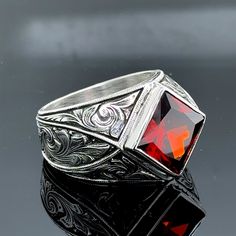 Man Silver Ruby Stone Ring, Engraved Vintage Red Ruby Ring, Men Wedding Ring, Zircon Stone Ring , 925k Sterling Silver Ring , Gift For Him ★Item Details * Gender : Male / Female * Material : 925K Sterling Silver * Total weight : 24 Grams * Gemstone : Ruby  Stone ✔ Ready to Ship in 1-2 Business Days .. ✔ Shipped to the Worldwide 1-5 business days with free shipping... ✔ The product will be sent to you with a handmade wooden box to avoid any damage during shipping... ✔ Visit our store, browse other Men's jewelry, silver and gold collections, and find the perfect piece you're looking for... Click For Our Other Products https://www.etsy.com/shop/MercansilverTR?ref=simple-shop-header-name&listing_id=1003010735 Formal Red Engraved Signet Ring, Formal Red Engraved Ring With Polished Finish, Red Engraved Signet Ring For Formal Occasion, Formal Red Diamond Cut Ring, Red Sterling Silver Rings With Diamond Cut, Sterling Silver Red Ruby Ring With Diamond Cut, Red Engraved Ring For Formal, Red Engraved Ring For Formal Occasions, Engraved Red Ring For Formal Events