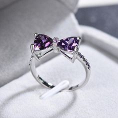 Luxury Purple Zircon Wedding Ring For Women Engagement Jewelry Brand Name: Genuine-GemstoneMetals Type: Silver PlatedGender: WomenMaterial: ZirconStyle: TRENDYRings Type: Wedding BandsShape\pattern: BowknotSetting Type: Prong SettingItem Type: RingsOccasion: Anniversary, Wedding, daily, party, shoppingMainstone Color: PurpleRing Size: US 6 7 8 9 10 # Amethyst Birthstone Ring, Amethyst Birthstone, Bow Ring, Rhinestone Bow, Zircon Ring, Purple Crystals, Engagement Jewelry, Silver Rhinestone, The Purple