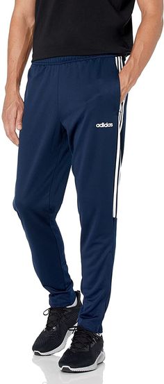 100% Polyester Imported Drawstring closure Stay dry, stay sharp. The sweat-wicking build of these soccer pants manages moisture as you train or just cut loose and relax. Tapered legs feature ankle zips for easy on or off. Slim fit is cut close to the body Front zip pockets for storage Drawcord on elastic waist lets you customize your fit; Ankle zips for convenience Climalite wicks sweat to keep you dry in every condition Nyc Mens Fashion, One Dapper Street, Mens Athletic Pants, Soccer Pants, Track Pants Mens, Mens Casual Outfits Summer, New Mens Fashion, Adidas Track Pants, Winter Outfits Men