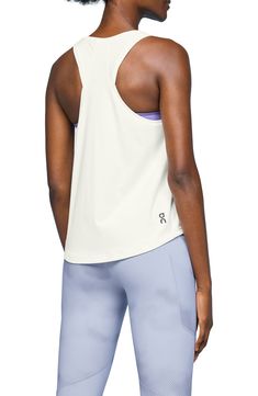 Get active in this easy-moving tank crafted from soft moisture-wicking fabric with a sleek racerback. 24" length (size Medium) Scoop neck Racerback 56% cotton, 39% polyester, 5% elastane Machine wash, tumble dry Imported Spring Athleisure Tank Top With Crew Neck, Spring Crew Neck Tank Top In Athleisure Style, Spring Athleisure Crew Neck Tank Top, Athleisure Stretch Racerback Tank Top, Stretch Racerback Tank Top For Athleisure, Athleisure Tank Top For Everyday Spring Wear, Spring Athleisure Tank Top For Everyday, Sleeveless Athleisure Tank Top For Everyday, Spring Athleisure Everyday Tank Top