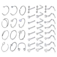 PRICES MAY VARY. Item Contain - 12pcs nose rings hoops septum ring + 24pcs nose studs screw mix style with a velvet pouch; Silver nose rings and studs pack; Gauge - Nose rings hoop 20g (0.8mm); inner dia.: 5/16"(8mm); Nose studs pole length: 7mm; Top and ball dia.: 2-3mm; Wide use - Nose rings studs and hoop nose rings pack 20gauge pack can be used for both the nose hoops, septum ring, lip rings hoop and l shape nose studs, nose screw, high nostril piercing jewelry; Material - Highly Polished, S Silver Nose Rings, Hoop Nose Rings, L Shaped Nose Ring, Nose Piercing Hoop, Nose Piercings, Nose Piercing Jewelry, Silver Nose Ring, Gold Nose Rings, Fake Jewelry