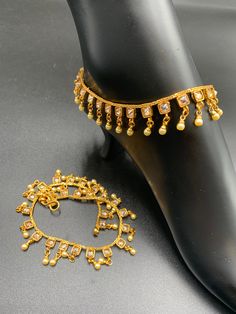 Antique look anklets with pearls and square type Kundans Handmade jewelry One gram gold jewelry Silver-plated jewelry Official Website globusfashions.com 🌸 S H O P . M O R E . S T Y L E S 🌸 https://www.etsy.com/shop/Globusfashions Necklaces - https://www.etsy.com/shop/Globusfashions?section_id=18712263 Bracelets - https://www.etsy.com/shop/Globusfashions?section_id=18969767 Pendant Sets - https://www.etsy.com/shop/Globusfashions?section_id=18707402 Tikka - https://www.etsy.com/shop/Globusfashi Elegant Metal Anklet For Festivals, Adjustable Gold Anklets With Latkans, Gold Metal Anklets For Festive Occasions, Elegant Stone Work Anklets For Festive Occasions, Gold Temple Jewelry Anklets As Gift, Gold Anklets For Party And Festivals, Gold Toe Ring Jewelry With Latkans, Gold Toe Ring With Latkans Jewelry, Elegant Gold Anklets For Festive Occasions