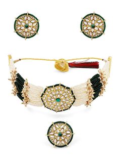 Welcome to Adornn Jewels This Choker jewellery set consists of a necklace, finger ring and a pair of earrings Gold-plated necklace has Green KUndan and Beads details Secured with a drawstring closure A matching pair earrings, each secured with a post-and-back closure Gold-plated adjustable finger ring  Size & Fit Length of the Necklace : 44 cm Length of the Earring : 3 cm Diameter of Finger ring: 2 cm(Adjustable) Material & Care Material: Alloy Plating: Gold-plated Stone type: Kundan & Beads Car White Choker For Ceremonial Festivals, White Ceremonial Choker For Festivals, White Ceremonial Festival Choker, Festive Round Kundan Choker, Traditional Choker Jewelry For Festivals, Bollywood Style Choker For Diwali Gift, Bollywood Style Choker For Diwali Celebration, Adjustable Bridal Necklace For Festive Occasions, Adjustable Bridal Necklace For Festivals