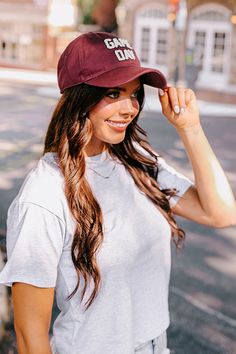 Get game day ready with this trendy baseball cap! - A rounded bill - An adjustable back - Cute sherpa 'GAME DAY' lettering on the front Sports Fan Baseball Cap With Curved Bill, Curved Bill Baseball Cap For Sports Fans, Collegiate Baseball Cap With Curved Visor For Baseball Season, College Snapback Hat With Curved Visor For Baseball Season, Curved Visor Snapback Hat For College Baseball Season, Casual Baseball Cap With Curved Visor For Fan Gear, Casual Baseball Cap With Curved Visor For Fans, College Dad Hat For Baseball Season With Curved Visor, College Snapback Dad Hat For Baseball Season