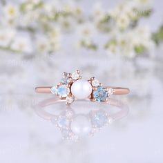 an image of a ring with pearls on it