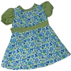 a blue and green dress with flowers on it