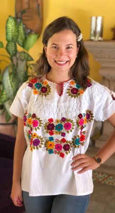 Mexican blouse, blouse with clips and fine embroidery, handmade blouse, blouse with multicolored floral embroidery, ethnic blouse, blouse of blanket. The embroidery of each blouse is unique so it may vary. This blouse is one size and fits S/M Mexican textile art has centuries of history and creativity throughout the country. Mexico is recognized as one of the leading countries with a beautiful aristic production in the textile world, miraculous hands of talented artisans from different states of Multicolor Bohemian Embroidered Top For Fiesta, Traditional Short Sleeve Blouse For Cinco De Mayo, Folk Multicolor Embroidered Tops For Cinco De Mayo, Traditional Multicolor Embroidered Floral Top, Folk Style Multicolor Embroidered Top For Cinco De Mayo, Multicolor Floral Embroidery Blouse For Fiesta, Bohemian Blouse With Multicolor Embroidery For Fiesta, Traditional Top With Floral Embroidery For Cinco De Mayo, Traditional Floral Embroidered Top For Cinco De Mayo