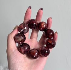 Material: Natural Red Hematoid Lepidocrocite Quartz beads  size :  21-22mm   quantity: one strand 6mm approx 29 pcs one strands 7mm approx25 pcs one strands 8mm approx 22 pcs one strands 9mm approx 21pcs one strands 10mm approx 19 pcs one strands 11mm approx 18pcs one strands 12mm approx 16 pcs one strands 13mm approx 16 pcs one strands 14mm approx 15 pcs one strands 15mm approx 14pcs one strands 16mm approx 14 pcs one strands 17mm approx 13pcs one strands 18mm approx 13pcs one strands 19mm appr Round Bracelets With Large Beads As Gift, Healing Bracelets With Large Beads, Large Beaded Round Crystal Bracelet For Gift, Handmade Red Crystal Bracelet, Beautiful Beaded Bracelet, Natural Red, Natural Crystals, Colour Tone, Womens Bracelets